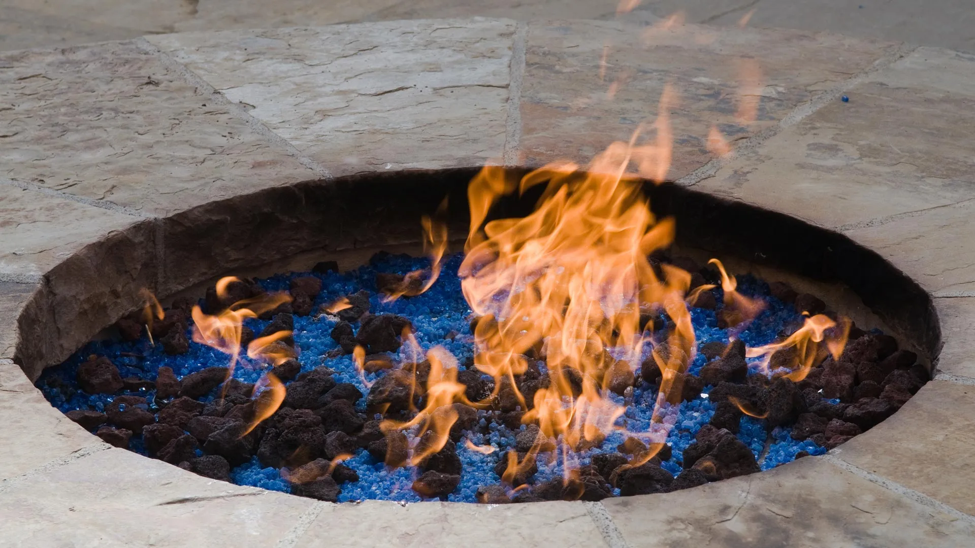 Fire Pits vs Outdoor Fireplaces - Which Fire Feature Is Right for You?