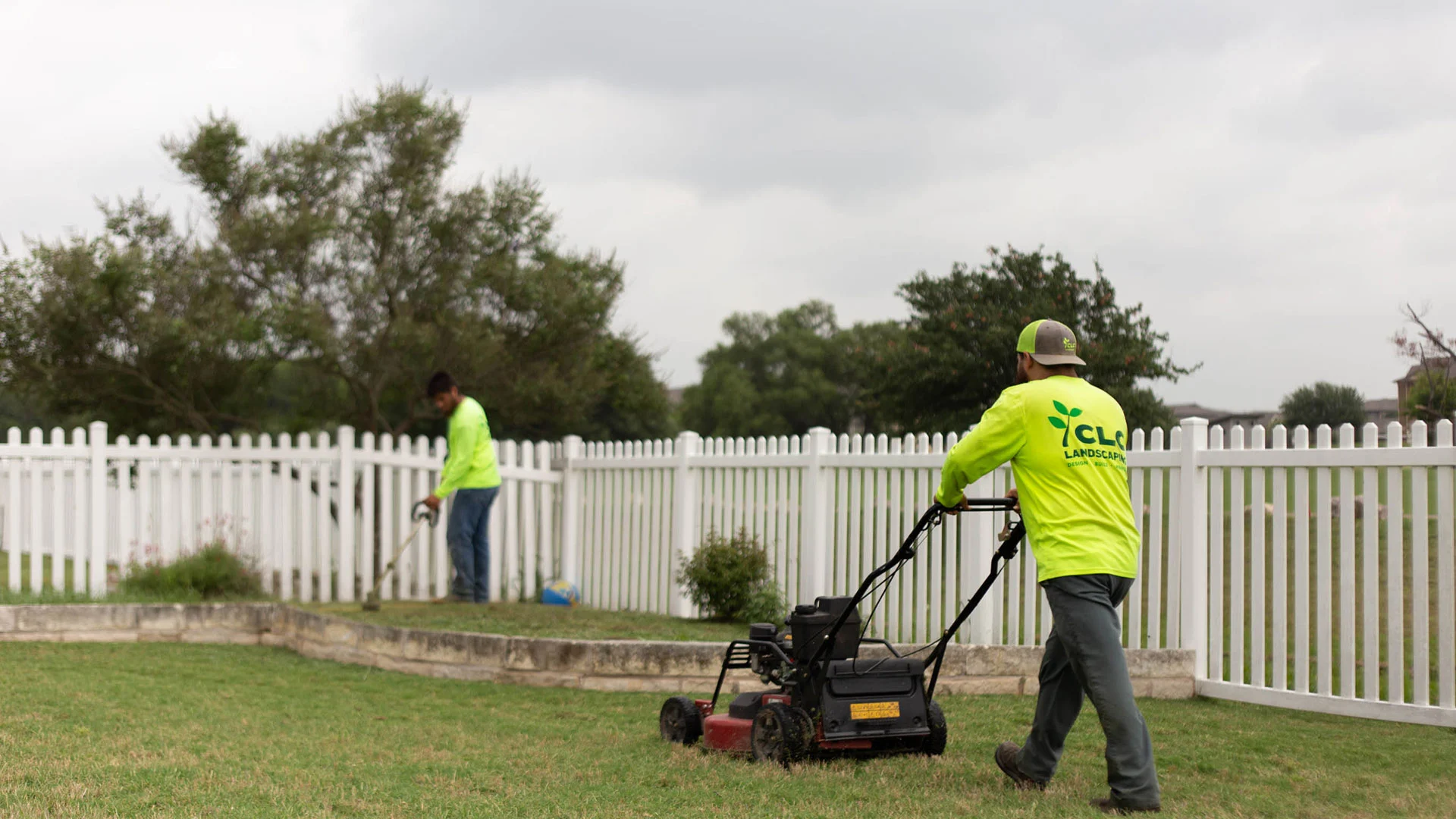 CLC professionals mowing lawn in San Marcos, TX.