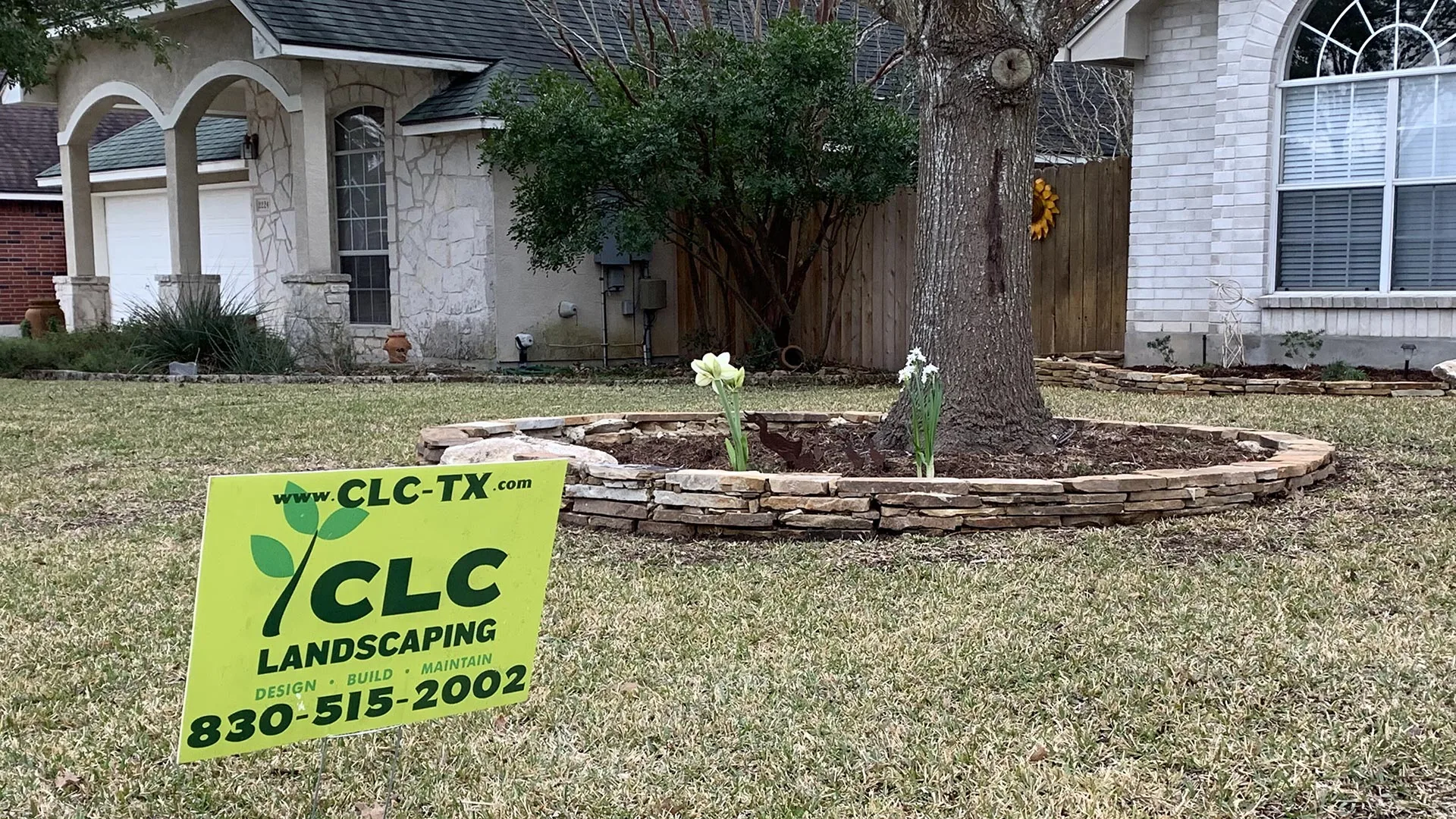 Our sign in our client's yard in Seguin, TX after a spring cleanup.