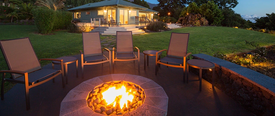 A custom built fireplace placed on a patio in Kyle, TX.