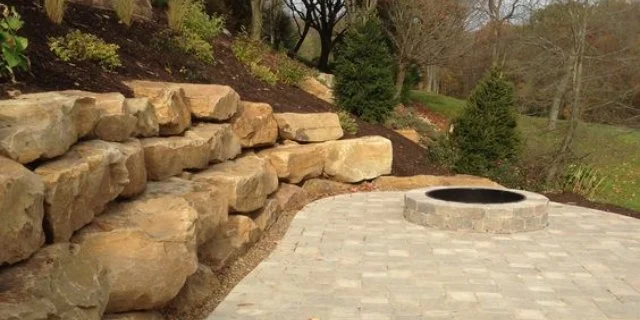 Custom fire pit installed on a patio in San Marcos, TX.