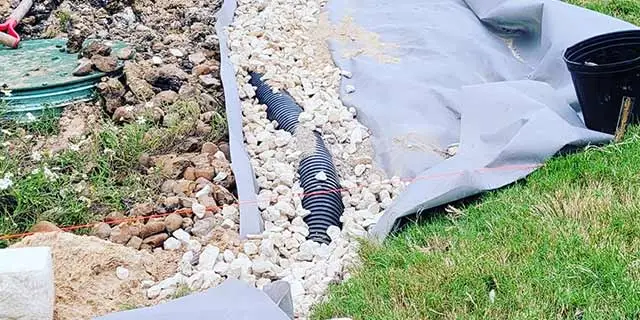 French drain being installed at a home in Kyle, TX.