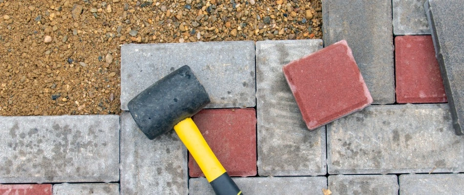 Mallet laid over unfinished project in New Braunfels, TX.