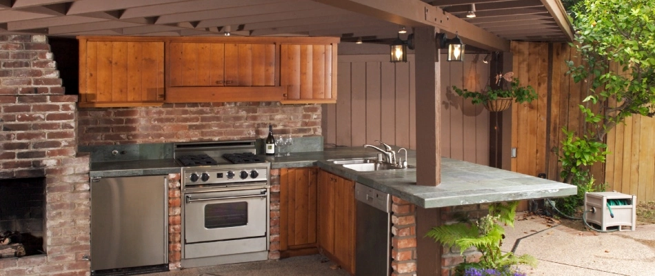 Outdoor kitchen with lighting installed in New Braunfels, TX.