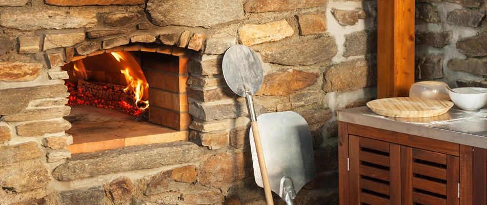 A pizza oven added to an outdoor kitchen build in San Marcos, TX.