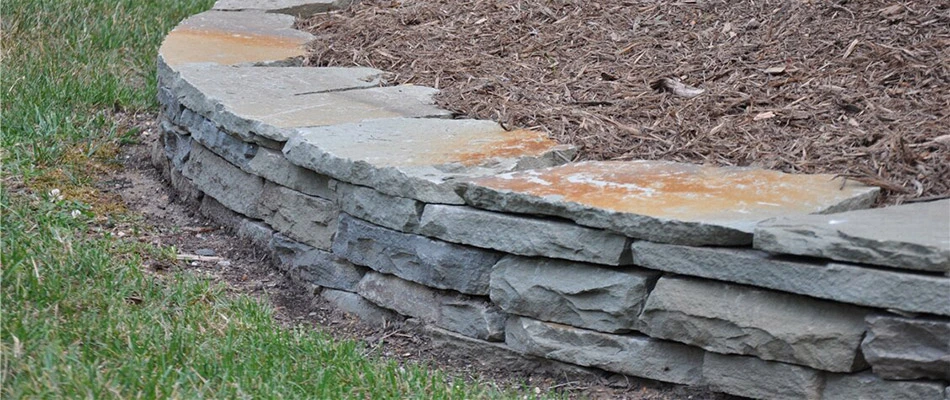 Retaining wall built for landscape bed in Buda, TX.