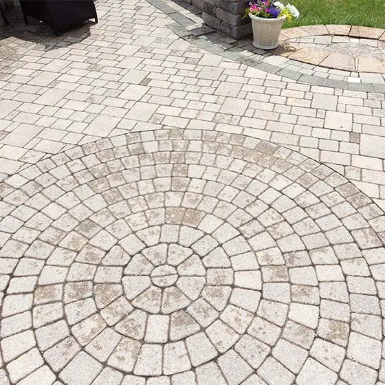 Custom patio with circular design at a home near New Braunfels, TX.